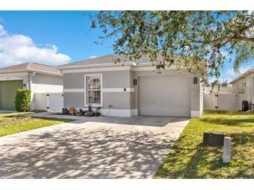 Charming single-Gathering home with a well-maintained lawn and a two-car garage at 2408 28Th E Ave, Palmetto, FL 34221