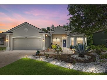 Charming single-story home with a well-manicured lawn and a welcoming front entrance at 259 Golden Harbour Trl, Bradenton, FL 34212