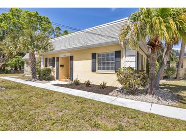 Charming home featuring a welcoming entrance and lovely landscaping at 2403 Aspinwall St, Sarasota, FL 34237