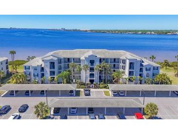 Beautiful waterfront condominium with covered parking and a coastal view at 920 Tidewater Shores Loop # 304, Bradenton, FL 34208