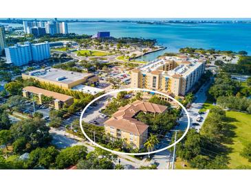 Beautiful aerial view of waterfront condos, showcasing the complex's proximity to the bay and downtown amenities at 1268 11Th St # 2402, Sarasota, FL 34236