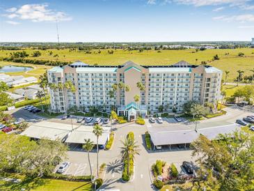 Stunning condominium with beautiful balconies and well-maintained landscaping, offering a luxurious living experience at 2320 Terra Ceia Bay Blvd # 305, Palmetto, FL 34221