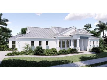 Charming single story home featuring a modern design with a light gray metal roof and lush tropical landscaping at 2508 Belvoir Blvd, Sarasota, FL 34237