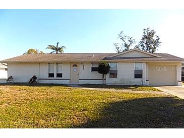 Charming single-story home with a well-maintained lawn and inviting curb appeal at 6309 35Th W Ave, Bradenton, FL 34209