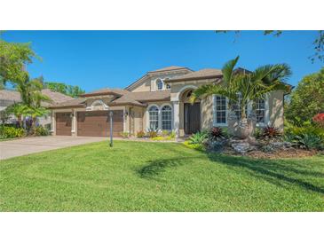 Lovely single-Gathering home with a well-manicured lawn and a three-car garage at 7407 Green St, Bradenton, FL 34201