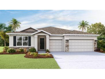 Charming single-Gathering home featuring stone accents, a two-car garage, and well-manicured landscaping at 10717 Tippecanoe Pl, Parrish, FL 34219