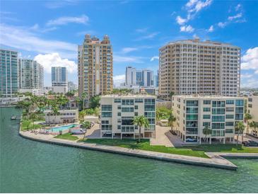 Beautiful condo building with an amazing waterfront view and community pool at 101 Sunset Dr # 102, Sarasota, FL 34236