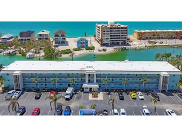 Gorgeous waterfront condominium with ample parking and beach access close to restaurants and other attractions at 9200 Midnight Pass Rd # 24, Sarasota, FL 34242