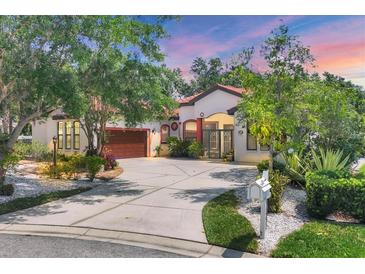 Charming single Gathering home with a well manicured lawn and 2 car garage at 11551 30Th E Cv, Parrish, FL 34219