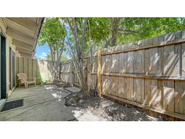 Private fenced back patio with room for outdoor seating at 500 N Jefferson Ave # 5, Sarasota, FL 34237