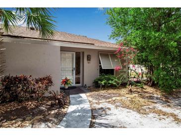 Charming home featuring an inviting front entrance with well-maintained landscaping at 721 N Jefferson Ave # 721, Sarasota, FL 34237