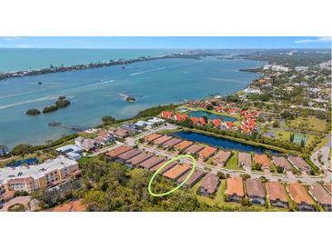 Expansive aerial view of the community with waterfront access and lush landscaping at 3921 Waypoint Ave, Osprey, FL 34229