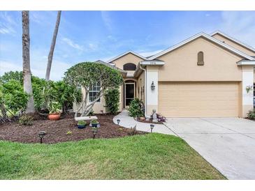Charming single-Gathering home with a well-manicured lawn and welcoming entryway at 3514 92Nd E Ave, Parrish, FL 34219