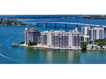 Waterfront condos with docks offer boat access and stunning ocean views under the bridge at 464 Golden Gate Pt # 702, Sarasota, FL 34236