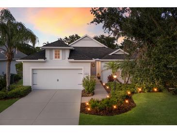 Charming single-Gathering home with a well-manicured lawn and inviting curb appeal at 5023 Brickell Park Cv, Bradenton, FL 34211