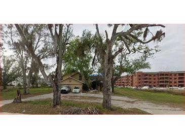 Charming single-Gathering home with mature landscaping and two-car garage at 6906 Simmons Loop, Riverview, FL 33578