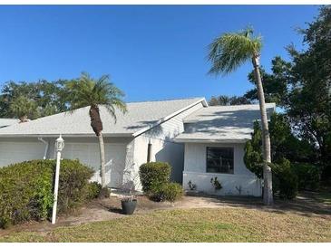 A beautiful single Gathering home with an attached garage and manicured landscaping at 3602 Bonaventure Ct, Sarasota, FL 34243