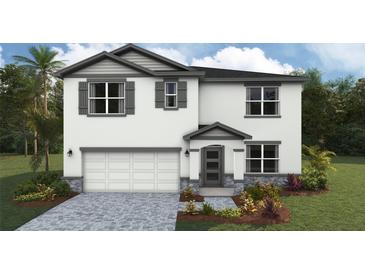 Charming two-story home with a two-car garage, neutral color palette, and well-maintained landscaping at 1742 Cobb Trl, Parrish, FL 34219