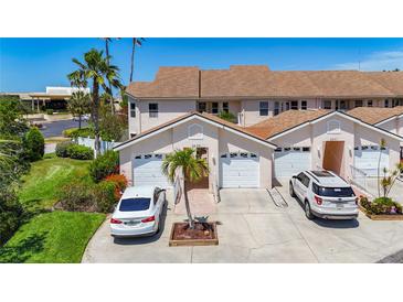 Charming townhomes with well-manicured lawns, driveways and attached garages, perfect for Florida living at 2609 Waterford Way # B, Palmetto, FL 34221