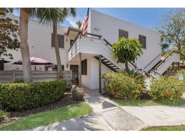 Inviting two-story condo with lush landscaping and a charming entrance at 536 Lakeside Dr # 0, Bradenton, FL 34210