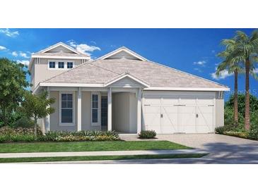Charming single-Gathering home featuring a two-car garage and beautifully landscaped front yard at 9212 Florida Rock Trl, Sarasota, FL 34240