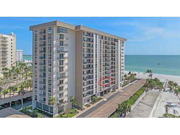 High-rise beachfront condo with balconies, offering stunning ocean views and convenient beach access at 1212 Benjamin Franklin Dr # 306, Sarasota, FL 34236