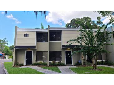 Inviting townhouse exterior featuring well-manicured landscaping and a serene, neighborhood feel at 4941 25Th W St # 101, Bradenton, FL 34207