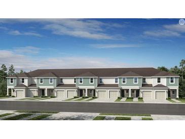 New townhomes with attached garages and manicured landscaping offer modern living at 15048 Cuzcorro Ct, Nokomis, FL 34275