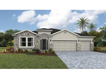 Beautiful single-Gathering home with a stone facade, three-car garage, and well-manicured lawn at 17142 James Trl, Parrish, FL 34219