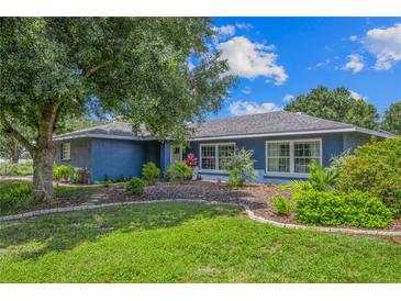Charming single-story home featuring a beautifully landscaped yard and a freshly painted exterior at 6605 253Rd St E, Myakka City, FL 34251