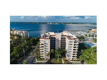 Multi-story condominium with balconies, offering waterfront views and convenient marina access at 1400 1St W Ave # 506, Bradenton, FL 34205
