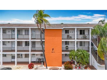 Condominium exterior displaying unit balconies, and assigned parking spaces at 2321 Canal Dr # F25, Bradenton, FL 34207