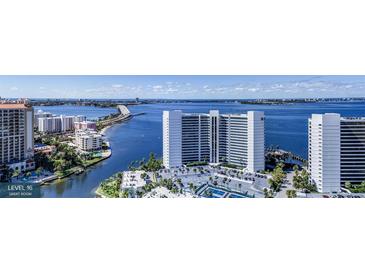 Stunning view of high rise buildings, beautiful water and clear blue skies at 555 Quay Cmn # 1601, Sarasota, FL 34236