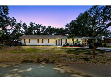 Charming single-story home featuring a neatly maintained front yard and classic architectural details at 3619 Elm St, Ellenton, FL 34222