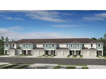 Beautiful townhome exterior with modern design and well-manicured lawns at 15160 Cuzcorro Ct, Nokomis, FL 34275