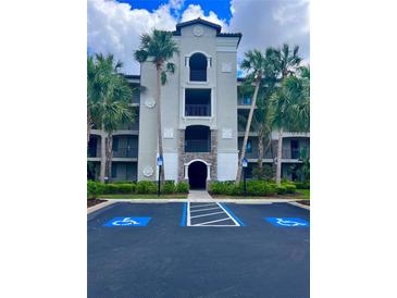 Beautiful building exterior with well-maintained landscaping and accessible parking spots at 17108 Vardon Ter # 401, Bradenton, FL 34211