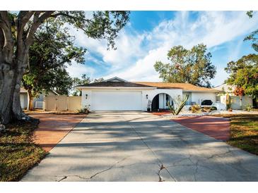 Charming single-story home with a well-maintained yard and inviting curb appeal at 603 Saint Andrews Dr, Sarasota, FL 34243