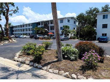 Well-maintained condo complex featuring ample parking and colorful, landscaped gardens in a sunny, tropical setting at 5895 17Th W St # B-26, Bradenton, FL 34207