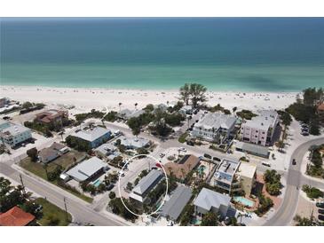 Beautiful beach home near the ocean with white sand and blue water views at 220 36Th St, Holmes Beach, FL 34217