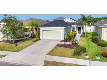 Charming single-story home with a well-manicured lawn and inviting curb appeal at 4315 Deep Creek Ter, Parrish, FL 34219