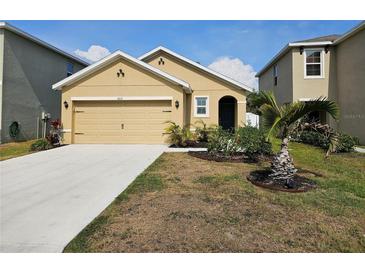 Charming single-story home with a well-manicured lawn and inviting curb appeal at 4012 Willow Hammock Dr, Palmetto, FL 34221
