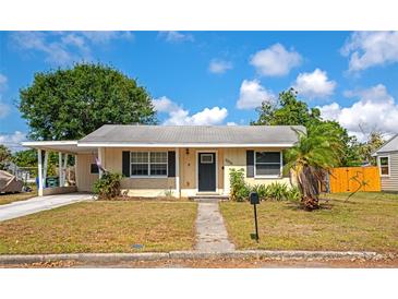 Charming single-story home with a covered carport, mailbox, and landscaped front yard at 2004 19Th W St, Bradenton, FL 34205