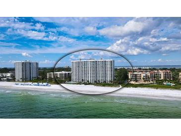 Breathtaking aerial view of beachfront condo with white sand and turquoise water at 2425 Gulf Of Mexico Dr # 6A, Longboat Key, FL 34228
