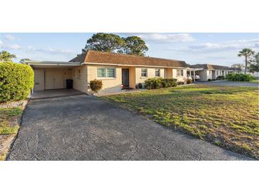 Charming single-story home with carport and well-maintained landscaping at 505 47Th Avenue W Dr, Bradenton, FL 34207