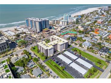 Beautiful aerial view of Lido Towers condos and the ocean in the distance at 1001 Benjamin Franklin Dr # 106, Sarasota, FL 34236
