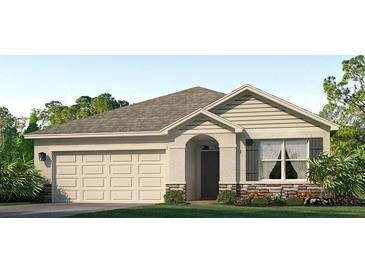 Charming single-story home featuring a two-car garage, stone accents, manicured lawn, and inviting covered entry at 18309 Canopy Pl, Lakewood Ranch, FL 34211