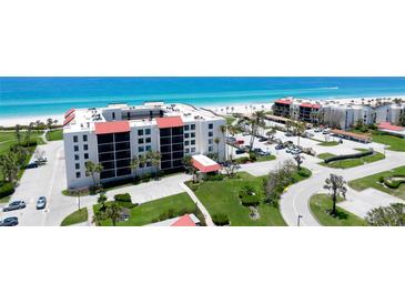 Beautiful beachside condos boast lush landscaping and easy beach access for relaxed coastal living at 1945 Gulf Of Mexico Dr # M2-313, Longboat Key, FL 34228