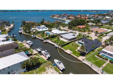 Beautiful waterfront property with canal access and private boat dock at 7779 Holiday N Dr, Sarasota, FL 34231