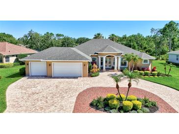 Beautiful, well-maintained home with a circular driveway and a three-car garage at 15006 21St E Ave, Bradenton, FL 34212