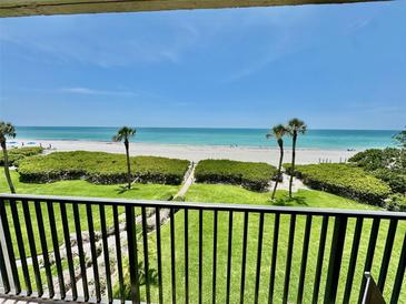 Beautiful balcony view overlooking the beach and Gulf of Mexico at 2675 Gulf Of Mexico Dr # 203, Longboat Key, FL 34228